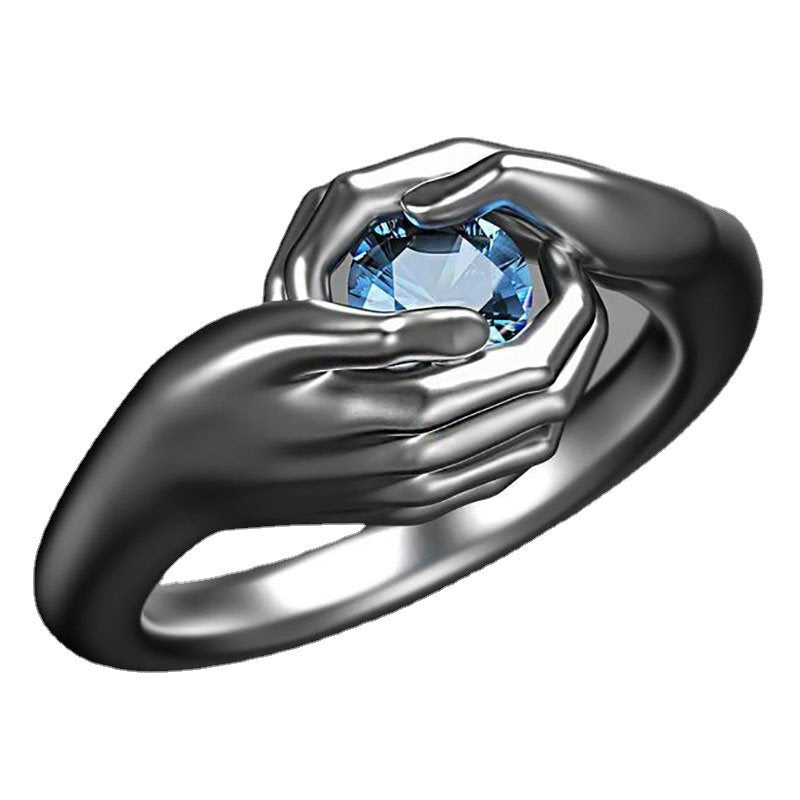 Silver-Plated Holding Hand Blue Crystal Ring image 1