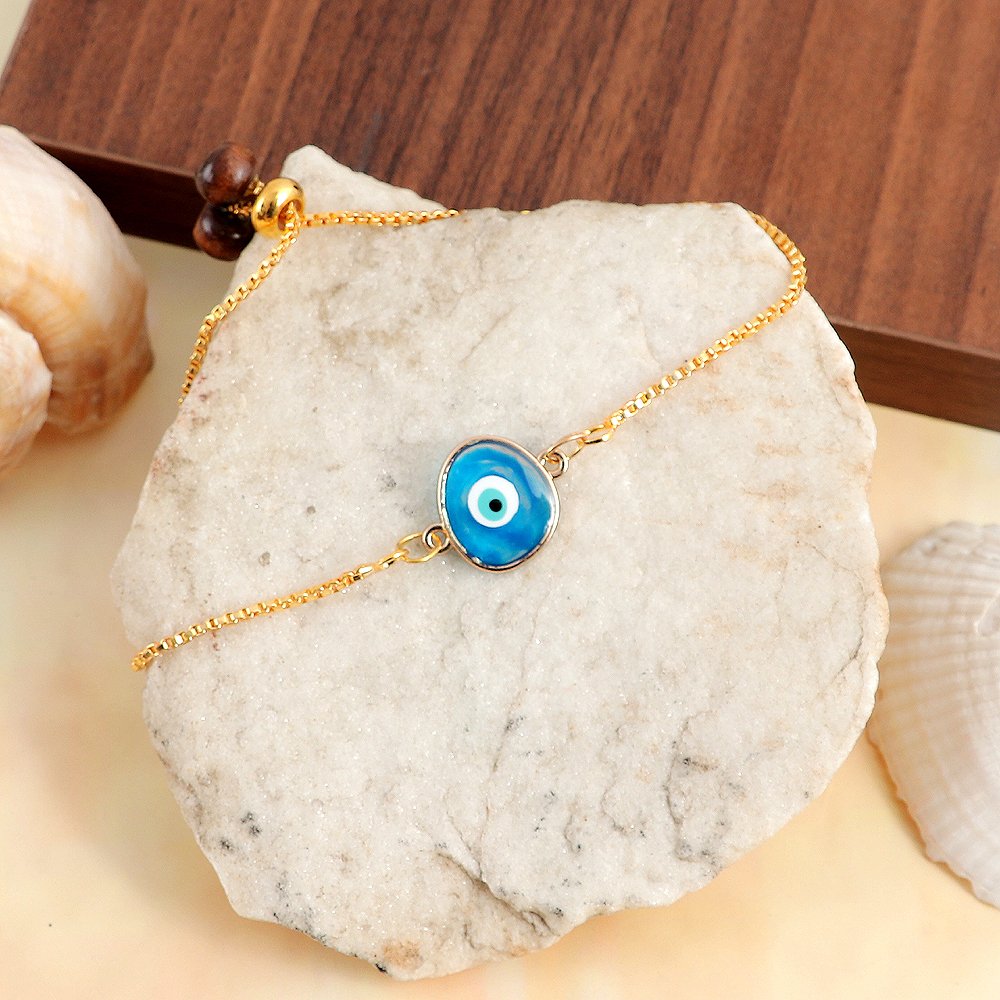 Gold-Toned Blue Evil Eye Mini Charm Bracelet/Rakhi image 0